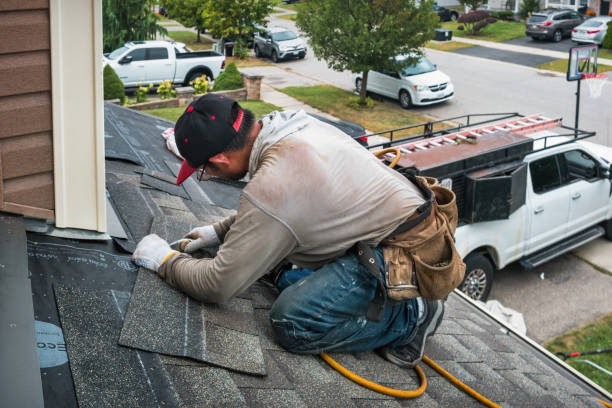 Professional Roofing technician working in Townsville, NC